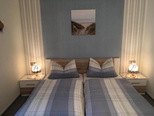 Postel nebo postele na pokoji v ubytování Pension Haus Wanninger