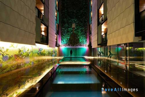 a swimming pool in the middle of a building at Stay Like Home in Melbourne