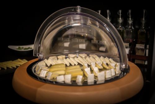 a display of food in a glass container at Forest Retreat&Spa in Oveselu