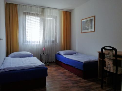 A bed or beds in a room at Apartment City-VIC