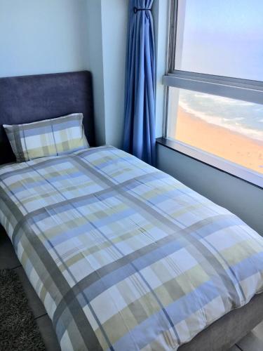 Hightide Apartmentにあるベッド