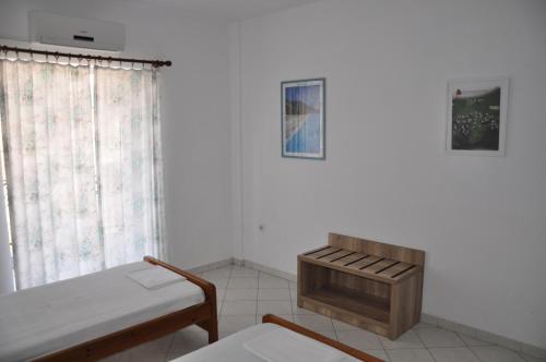Ένα ή περισσότερα κρεβάτια σε δωμάτιο στο Apartments Stavroula Ηospitality