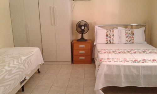 Tempat tidur dalam kamar di Refúgio na Serra