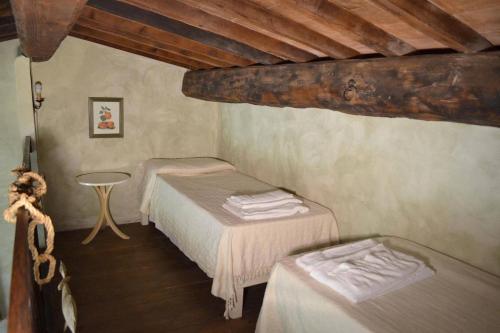 Katil atau katil-katil dalam bilik di Agriturismo Borgo Santa Maria