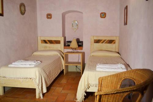 Katil atau katil-katil dalam bilik di Agriturismo Borgo Santa Maria