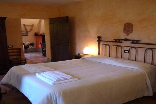 Katil atau katil-katil dalam bilik di Agriturismo Borgo Santa Maria