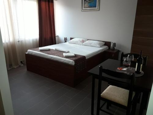 Postel nebo postele na pokoji v ubytování Apartment Poseidon