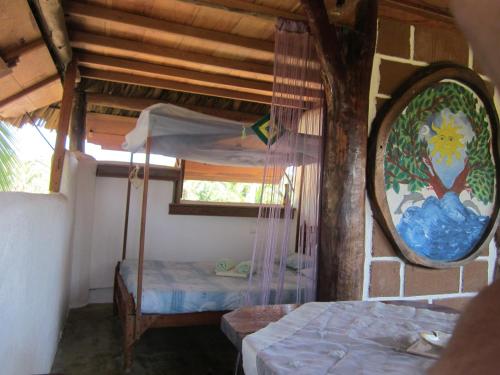 Una cama o camas en una habitación de Castillo Oasis