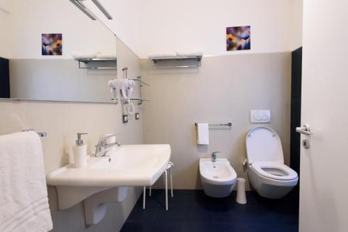 a bathroom with a sink and a toilet at Un B&B al Belvedere in Enna
