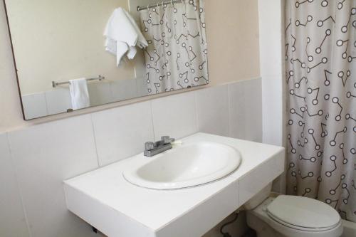 Koupelna v ubytování Hotel Mac Arthur