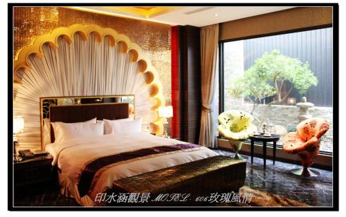 Giường trong phòng chung tại Yin Shui Han Motel