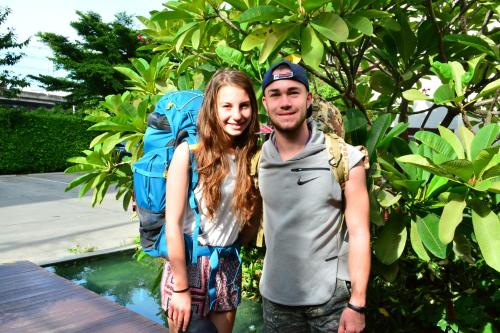 a man and a woman posing for a picture at The Choice Hotel - Adults Only in Bangkok