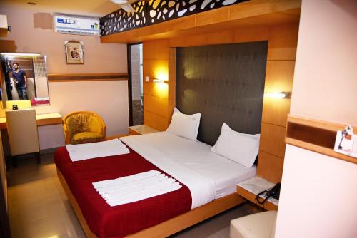 Postel nebo postele na pokoji v ubytování Grand Choice