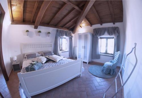 Llit o llits en una habitació de Il Palazzetto sulla Francigena