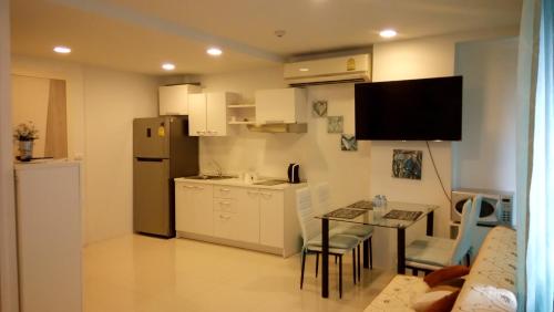 Кухня або міні-кухня у Acqua Apartment