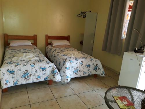 Un pat sau paturi într-o cameră la Hotel Ana's