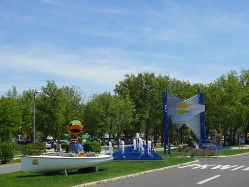 a statue of a boat on the side of a road at Pension Peterhof in Mörbisch am See