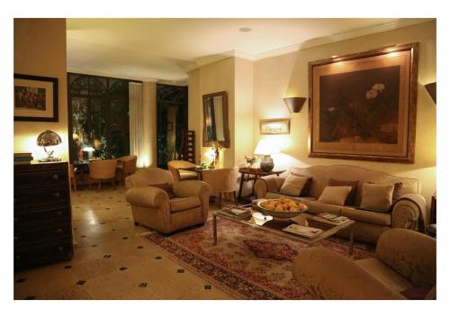 a living room with a couch and a table at La Maison de Tanger in Tangier