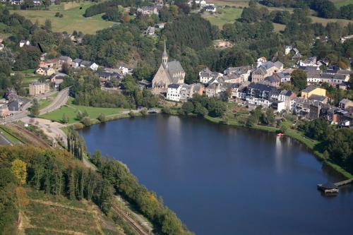 an aerial view of a large lake in a town at B&B Les Tilleuls in Vielsalm