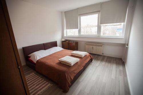 Posteľ alebo postele v izbe v ubytovaní RiverView apartment