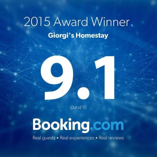 a poster with the words warranted winner of a award winner of ahomologically at Giorgi's Homestay in Kutaisi