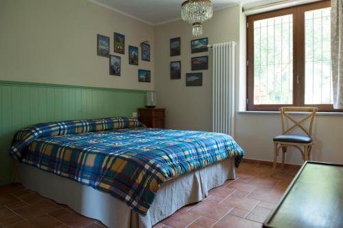 Кровать или кровати в номере Ca' dal Pipa