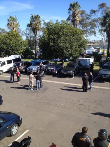 a group of people standing in a parking lot at Lakeview Motel in Yarrawonga