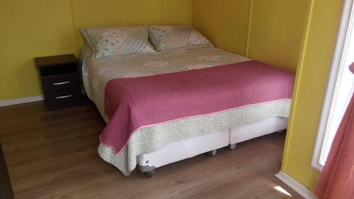 Cama o camas de una habitación en Cabañas Oslo