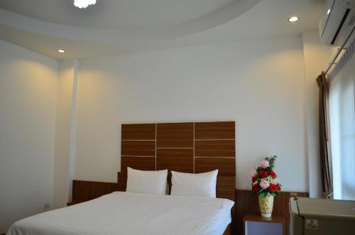 Ketsara Hotelにあるベッド