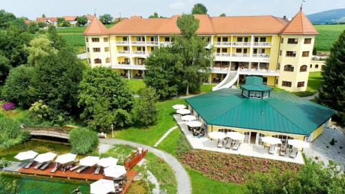 an aerial view of a hotel with a resort at Wellnesshotel Parkschlössl zu Thyrnau Ihr adults only SPA Resort in Thyrnau