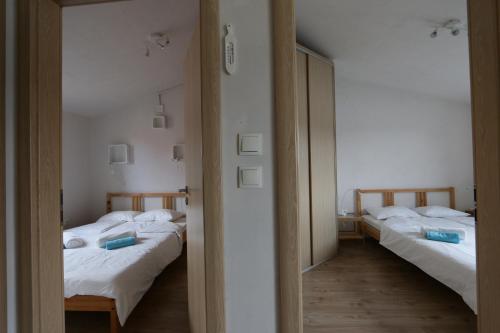 מיטה או מיטות בחדר ב-Apartments Marko Rava