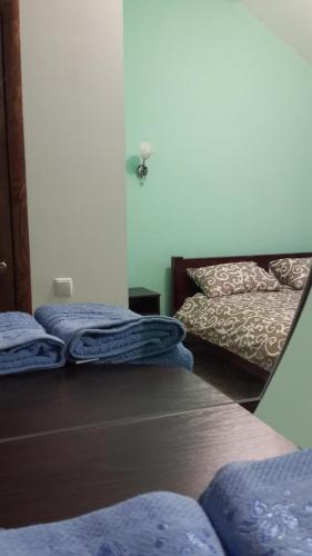 Postel nebo postele na pokoji v ubytování Hotel