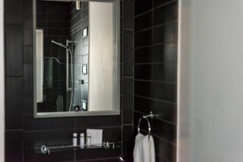 Koupelna v ubytování Hotel Una