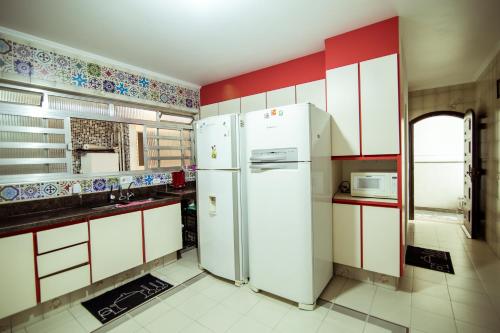 Hotel Alvorada do Sol tesisinde mutfak veya mini mutfak