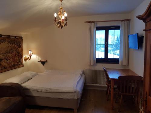 Ένα ή περισσότερα κρεβάτια σε δωμάτιο στο Haus Sonnleiten