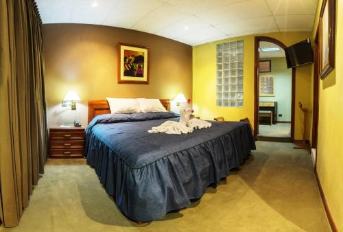 מיטה או מיטות בחדר ב-Hotel Continental (Cajamarca)