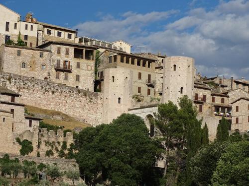 an old castle on top of a hill at Residence Terra Dei Santi Country House in Spello