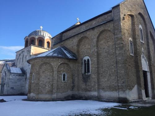 an old brick church with a tower on top at Prenociste DM5 in Novi Pazar