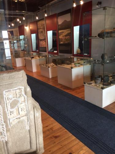 a museum with a couch and other artifacts on display at Prenociste DM5 in Novi Pazar