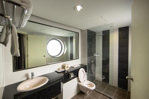 Een badkamer bij Beta Service Apartment