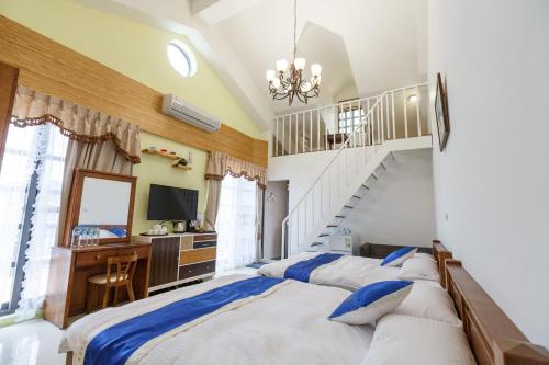 Posteľ alebo postele v izbe v ubytovaní YiShan Farm Homestay