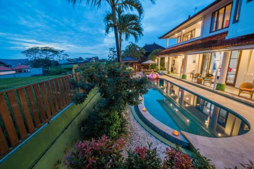 an image of a villa with a swimming pool at Villa Padi Karo in Canggu