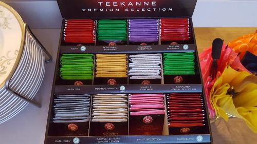 a box filled with different colored bangles on a table at Pension Diana-Parndorf in Parndorf