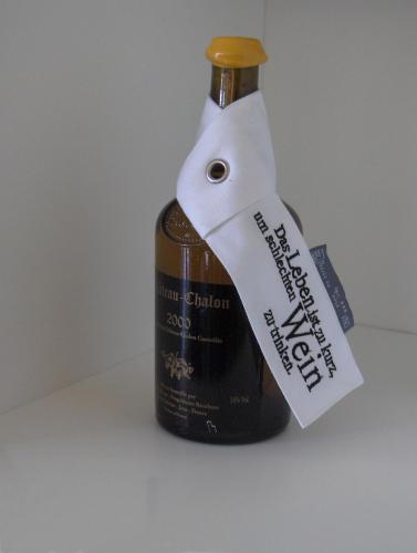 a bottle of wine with a label on it at Hotel Gasthof Kapelhof in Erpe-Mere