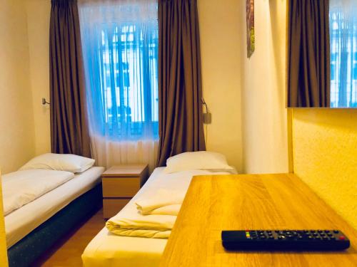 Letto o letti in una camera di City Hotel Storch