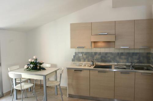 Köök või kööginurk majutusasutuses Residence La Dolce Vita