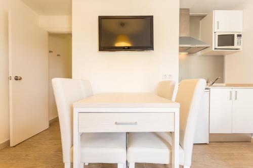 Η κουζίνα ή μικρή κουζίνα στο Caprice Janeiro Hotel & Spa