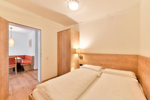 Cama o camas de una habitación en Hotel Bergheim