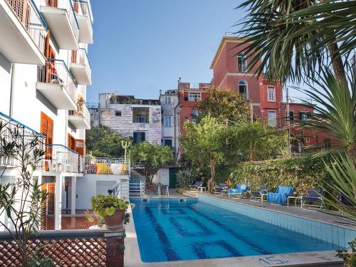 a swimming pool in the middle of a building at Hotel Club in Sant'Agnello