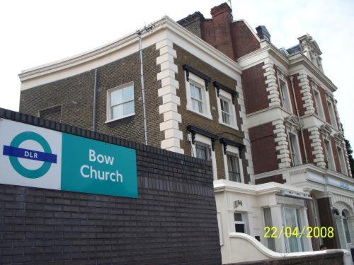 a large brick building with a sign in front of it at Citystay Hotel in London